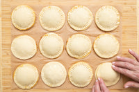 Folding and sealing the pastry to form hand pies