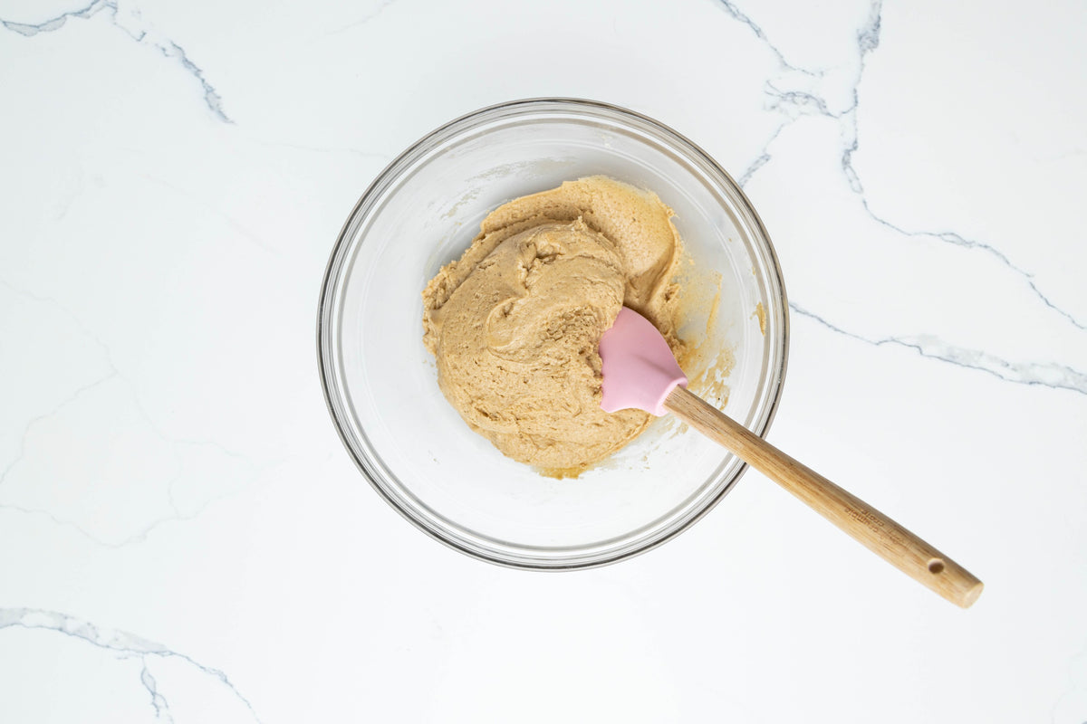 Mixing the chai spiced biscotti dough with a spatula