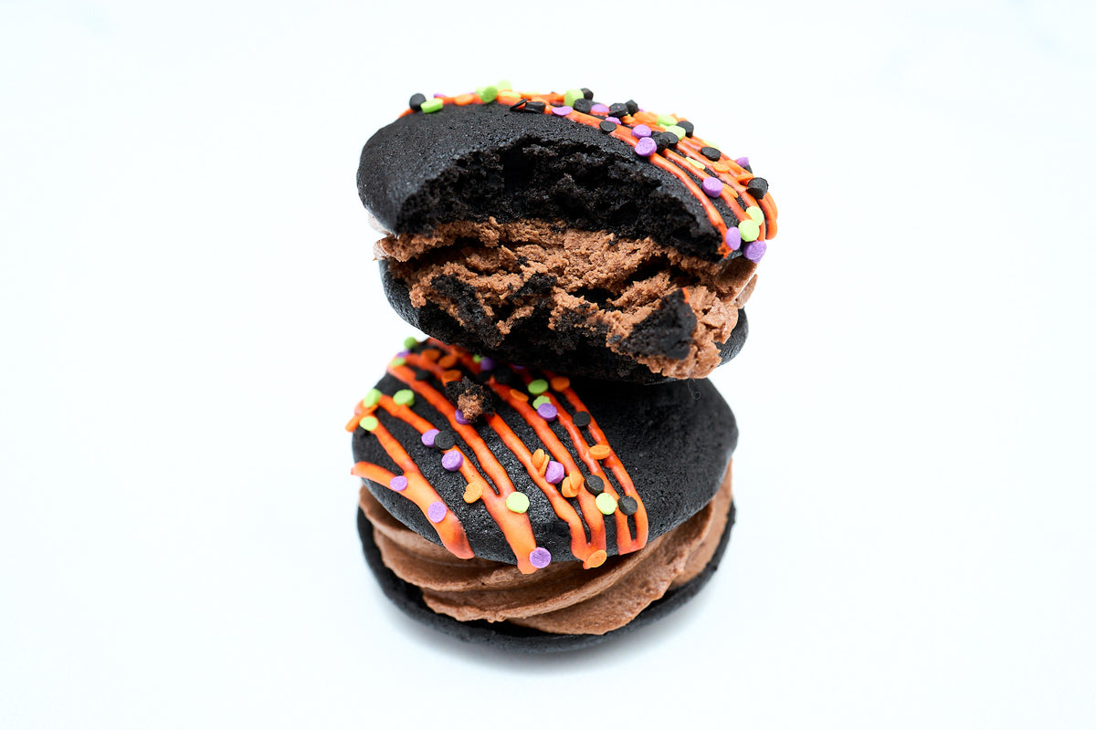 Bitten Blackout Whoopie Pie showing the soft cake and creamy chocolate centre