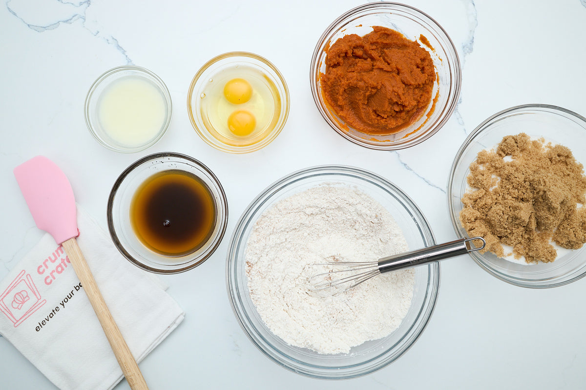 Ingredients laid out for making the pumpkin cake batter