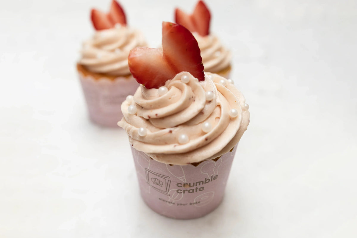 Lemon Cupcakes With Strawberry Buttercream by Crumble Crate