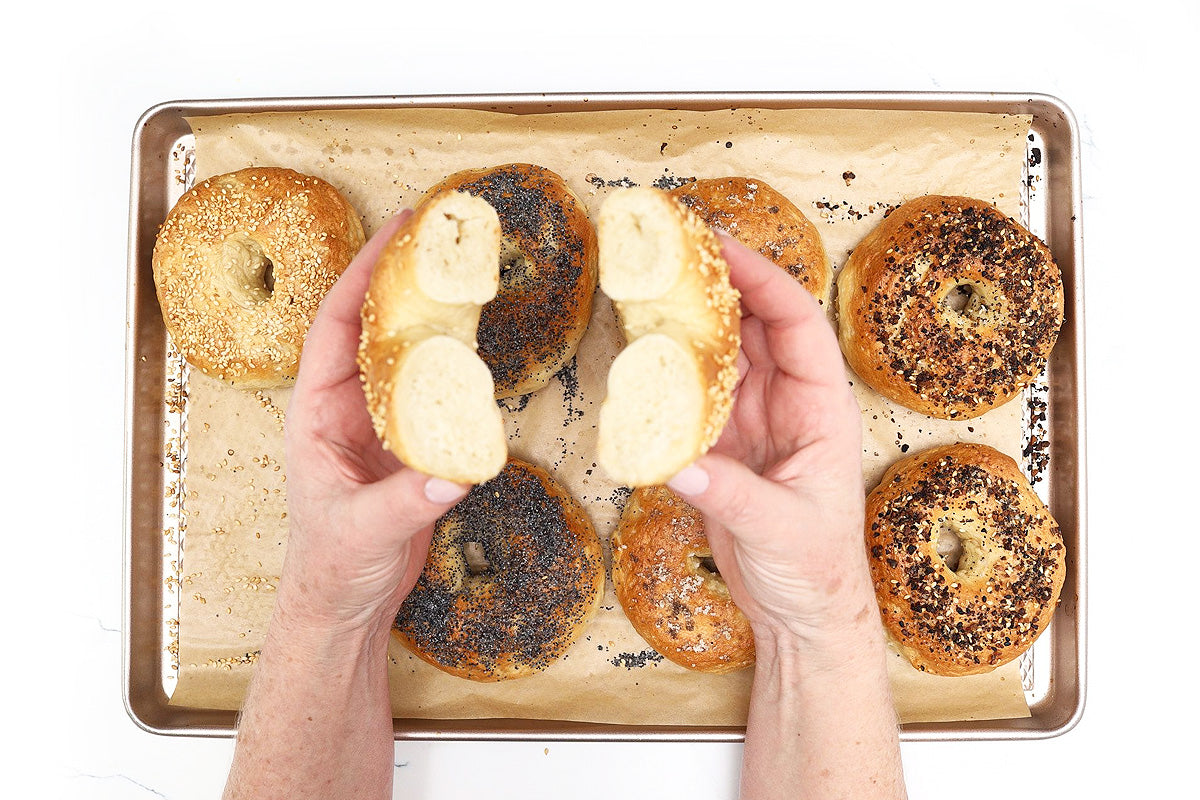 Assembling pastries with cream and fruit toppings from a premium dessert baking kit