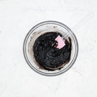 Mixed chocolate crinkle cookie dough in a glass bowl
